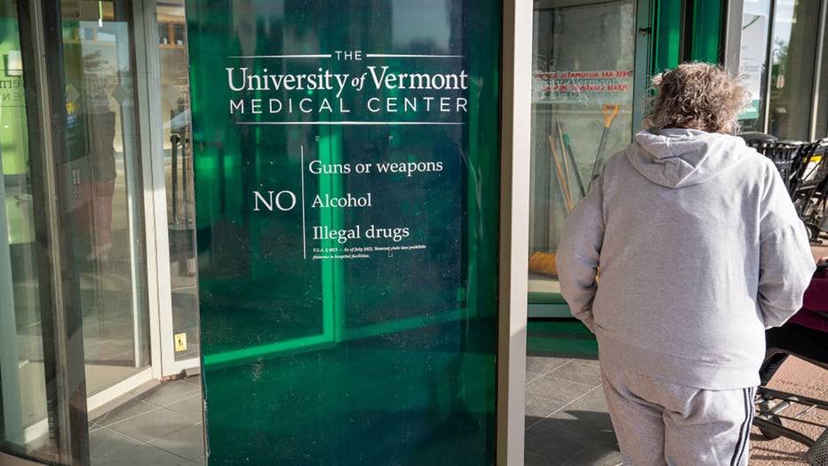 FILE - Visitors and patients enter the main entrance to the University of Vermont Medical Center on Nov. 17, 2023, in Burlington, Vermont. (Photo by Robert Nickelsberg/Getty Images)