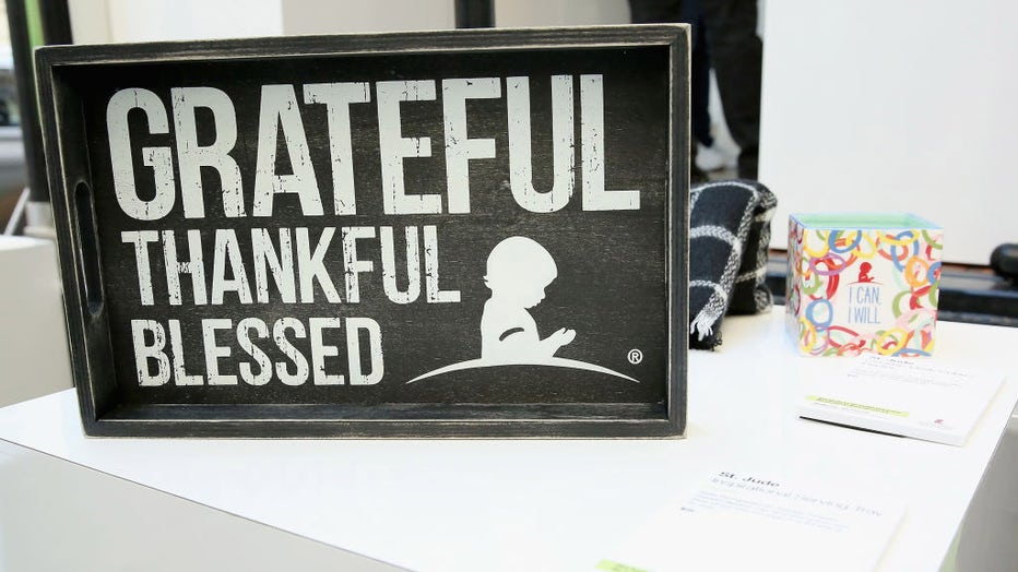 FILE - A view of gifts as St. Jude Children's Research Hospital hosts the #GiveThanks Holiday Pop-Up for #GivingTuesday on Nov. 28, 2017, in New York City. (Photo by Monica Schipper/Getty Images for St. Jude Children's Research Hospital)