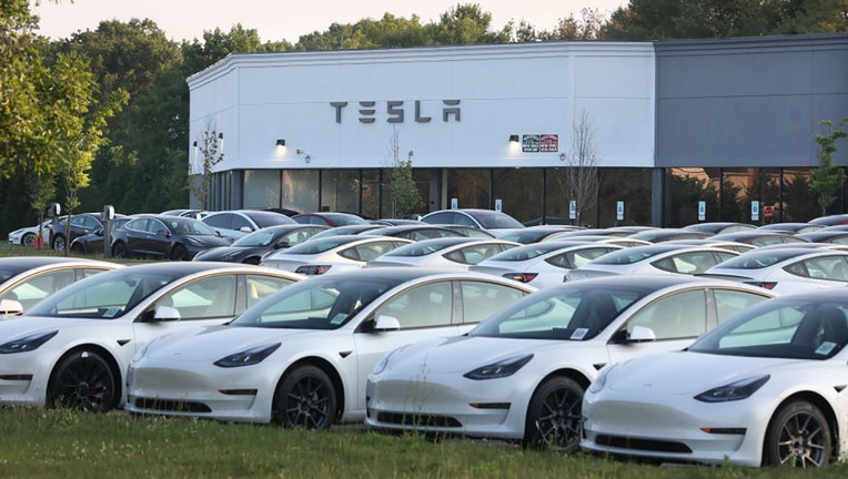 FILE - New Tesla electric vehicles fill the car lot at the Tesla retail location in Smithtown, New York, on July 5, 2023. (Photo by John Paraskevas/Newsday RM via Getty Images)