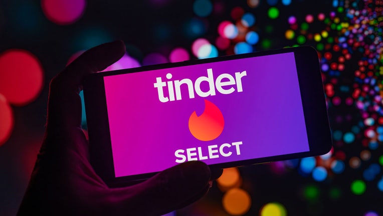 FILE - Tinder Select logo displayed on a smartphone. (Photo Illustration by Jonathan Raa/NurPhoto via Getty Images)