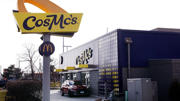 A sign hangs outside of a CosMcs restaurant, a concept recently launched by McDonald’s on December 11, 2023 in Bolingbrook, Illinois. (Photo by Scott Olson/Getty Images)