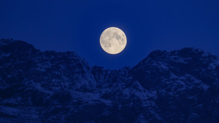 FILE - A night view of Mount Erek as cold full moon appears in the sky in Van, Turkiye on Dec. 7, 2022. (Photo by Ozkan Bilgin/Anadolu Agency via Getty Images)