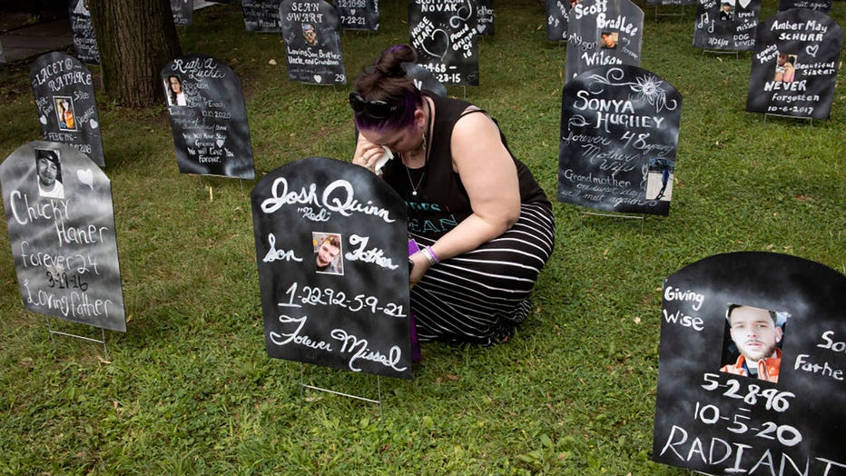 FILE IMAGE - Family members of people who have died from overdosing on opioids mark International Overdose Awareness Day on August 21, 2021, in Binghamton, New York. (Photo by Andrew Lichtenstein/Corbis via Getty Images)