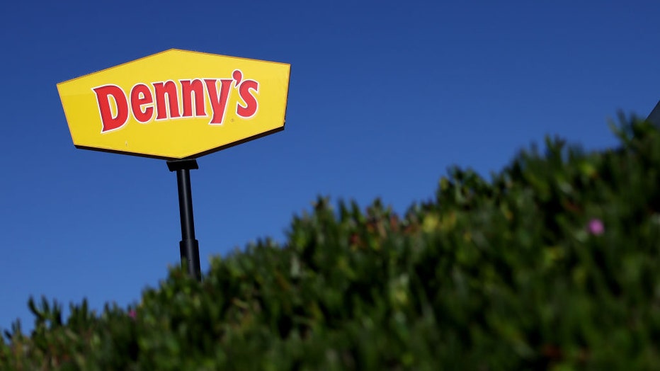 FILE - A sign is posted in front of a Dennys restaurant on February 13, 2023, in Emeryville, California. (Photo by Justin Sullivan/Getty Images)
