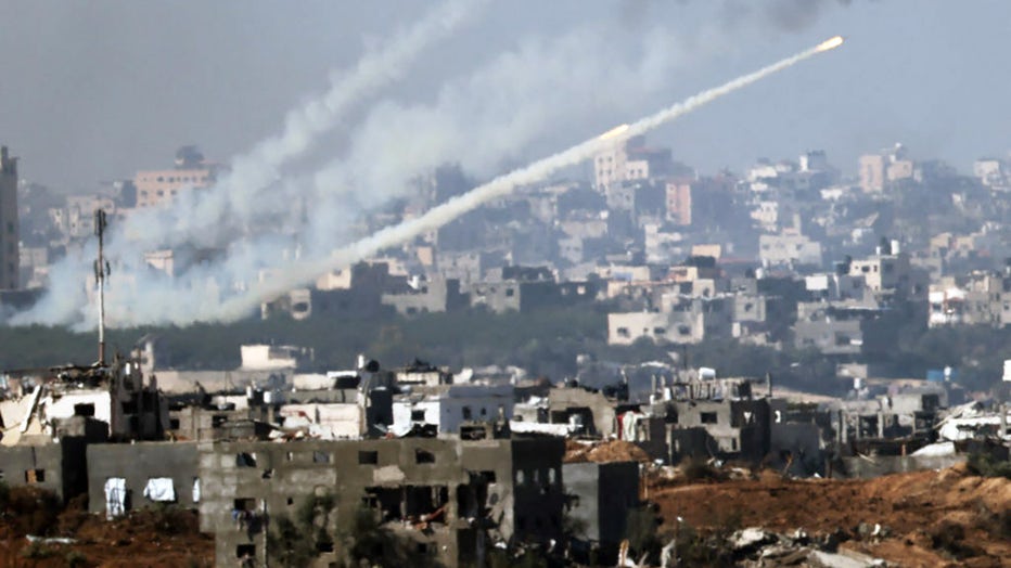 This picture taken from southern Israel near the border with the Gaza Strip shows a rocket being fired from inside Gaza towards Israel, as battles resumed between the Israeli forces and Hamas militants, on Dec. 1, 2023. (Photo by JACK GUEZ/AFP via Getty Images)