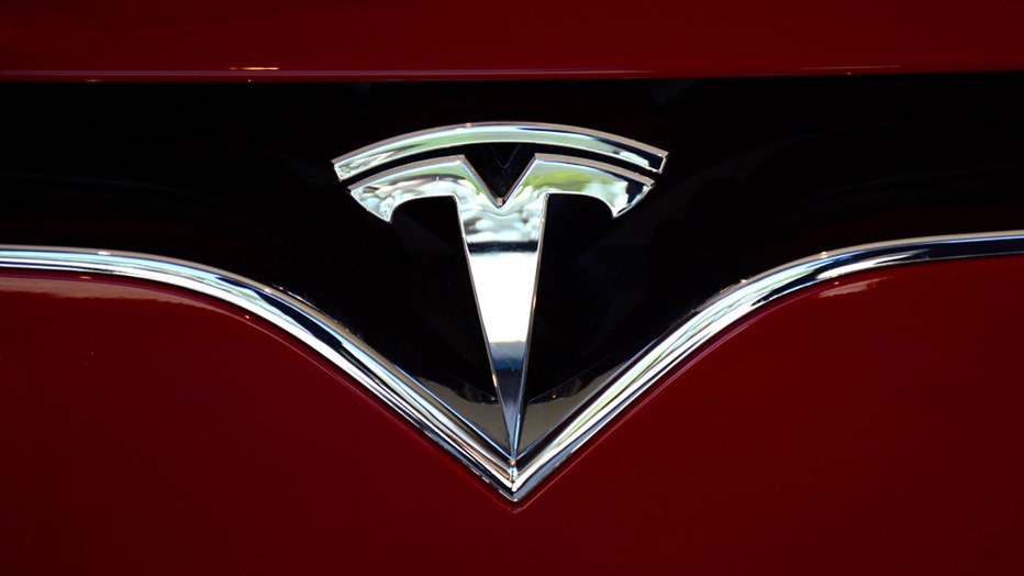 FILE - The Tesla brand logo is pictured in Vail, Colorado. (Photo by Robert Alexander/Getty Images)
