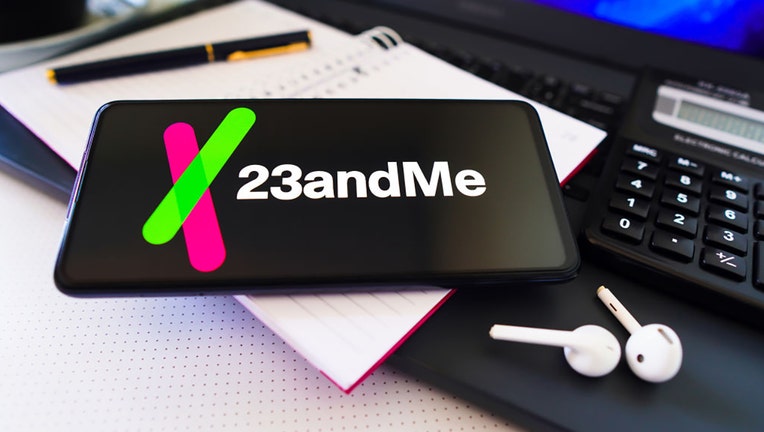 In this file photo, the 23andMe logo is displayed on a smartphone screen. (Photo Illustration by Rafael Henrique/SOPA Images/LightRocket via Getty Images)