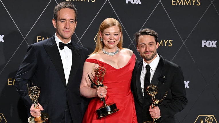 (From L) British actor Matthew Macfadyen, winner of Best Supporting Actor in a Drama Series, Australian actress Sarah Snook, winner of Best Actress in a Drama Series and US actor Kieran Culkin, winner of Best Actor in a Drama Series for "Succession" pose in the press room during the 75th Emmy Awards at the Peacock Theatre at L.A. Live in Los Angeles on January 15, 2024. (Photo by ROBYN BECK/AFP via Getty Images)