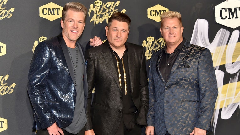 FILE - (L-R) Joe Don Rooney, Jay DeMarcus, and Gary LeVox of Rascal Flatts attend the 2018 CMT Music Awards at Bridgestone Arena on June 6, 2018, in Nashville, Tennessee. (Photo by Mike Coppola/Getty Images for CMT)