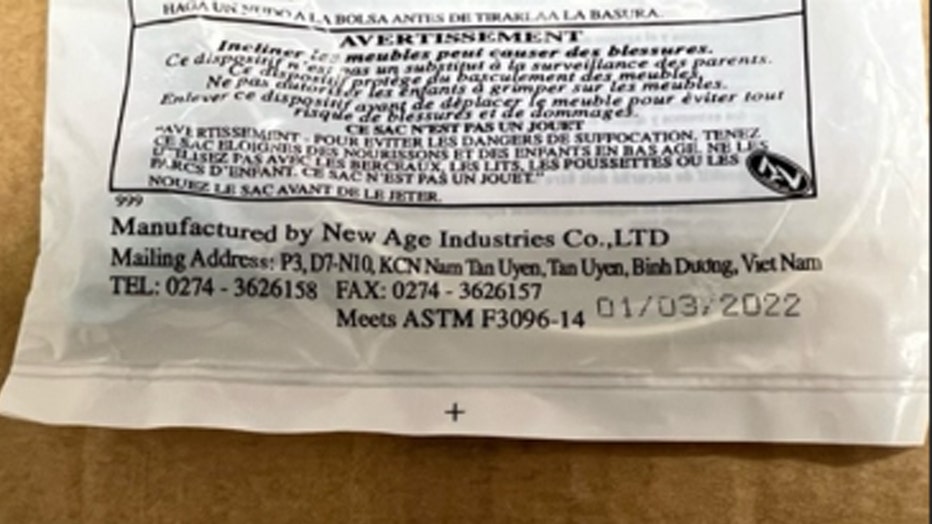 Packaging containing the recalled New Age tip restraint kits, stating 