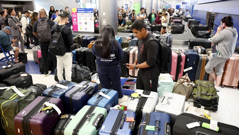 Top travel stresses include carrying heavy bags through airport,  holidaymakers say - Mirror Online