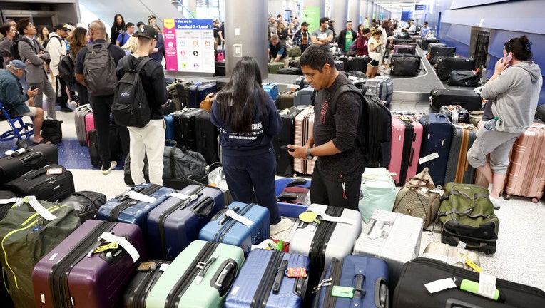 Southwest checked bag online cost