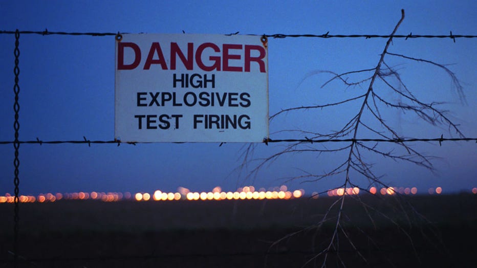 FILE - Tumbleweeds collect on the barbed wire fence that surrounds the U.S. Department of Energy's Pantex plant on May 21, 2002. (Photo by Smiley N. Pool/Houston Chronicle via Getty Images)