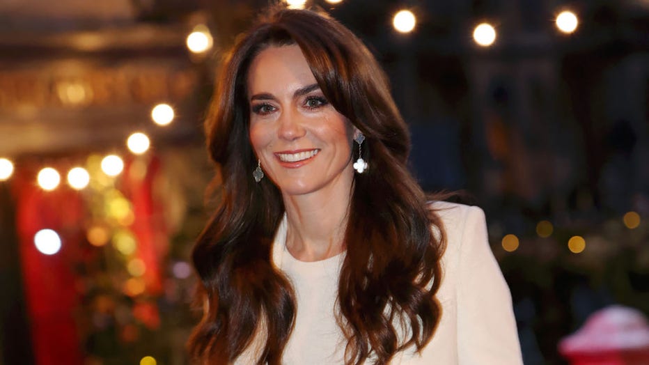 FILE - Britains Catherine, Princess of Wales, smiles as she arrives to attend the "Together At Christmas" Carol Service" at Westminster Abbey in London on Dec. 8, 2023. (Photo by Chris Jackson / POOL / AFP) (Photo by CHRIS JACKSON/POOL/AFP via Getty Images)