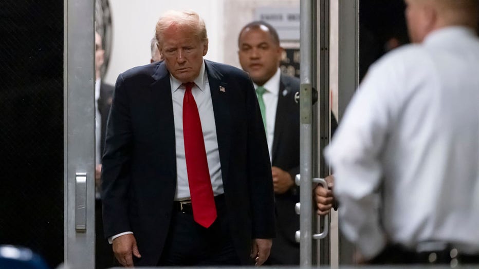 Former U.S. President Donald Trump returns from a break as closing arguments continue in his hush money trial at Manhattan Criminal Court on May 28, 2024, in New York City. (Photo by Andrew Kelly-Pool/Getty Images)