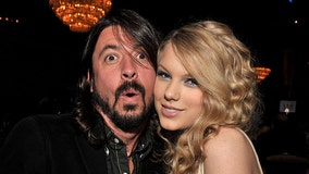 Taylor Swift lauds her band after Dave Grohl implies she doesn't play live music