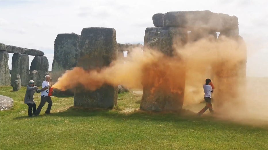 Just Stop Oil protesters sprayed orange powder onto Stonehenge, the iconic megalithic structure near Salisbury, England, on June 19, 2022. (Credit: Just Stop Oil via Storyful)