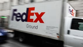 FedEx worker dies after falling from moving truck while trying to close door