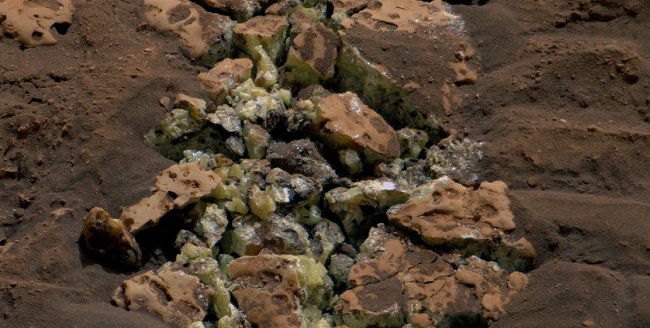 Rock crushed by Mars rover reveals crystals never before seen on