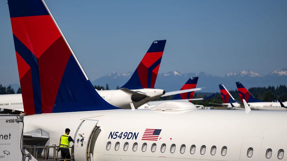 FILE - Delta Airlines planes are seen parked at Seattle-Tacoma International Airport on June 19, 2024, in Seattle, Washington. (Photo by Kent Nishimura/Getty Images)