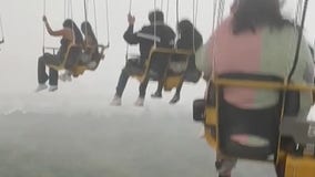 Watch: Six Flags Mexico riders stranded midair during storm, caught in heavy rain