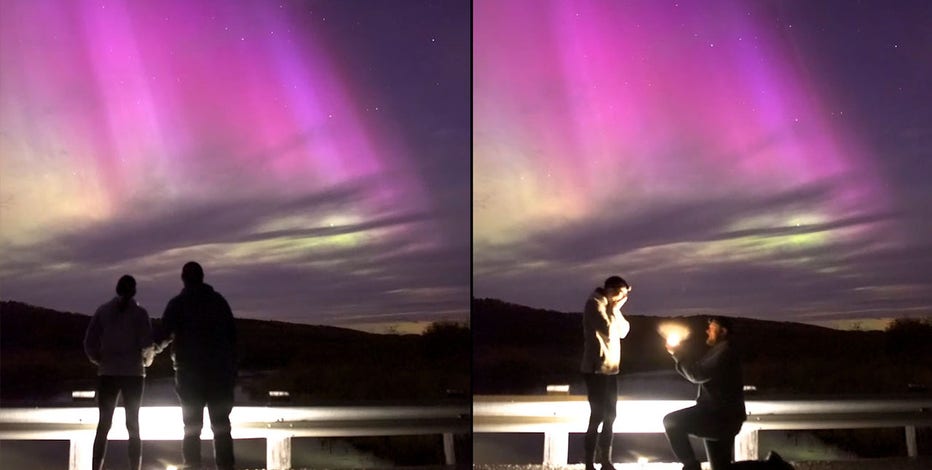 Watch magical moment man proposes under dreamy purple aurora