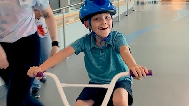 Watch: Nebraska boy with rare disorder rides customized bike for 1st time