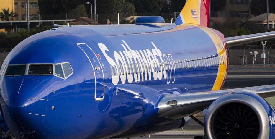Two injured after cell phone battery sparks fire on Southwest flight in Denver