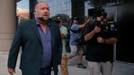 Alex Jones retains Infowars for now after judge denies The Onion's winning auction bid