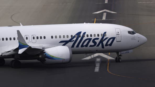 Woman climbs onto wing of Alaska Airlines plane at Seattle airport due to 'anxiety'