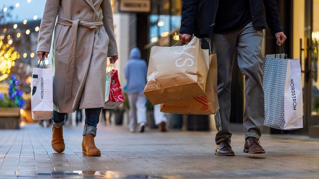 In-person shopping makes comeback amid record-spending holiday season