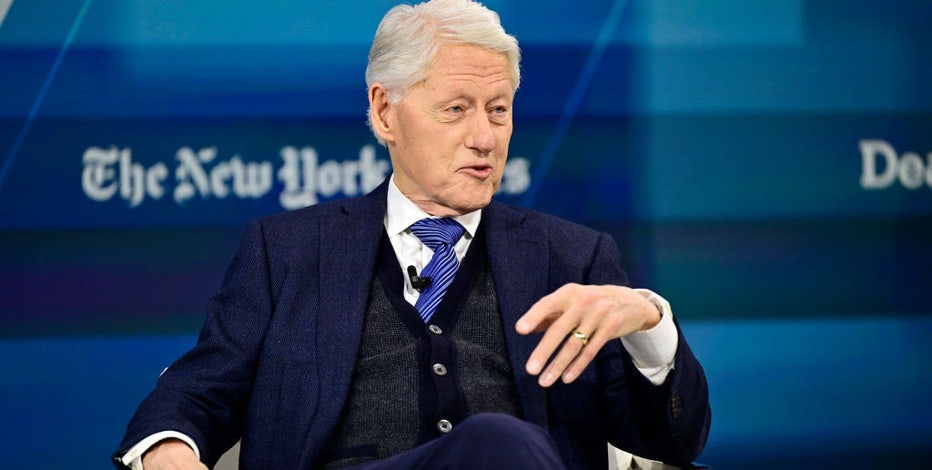 Bill Clinton hospitalized in DC for fever, in 'good spirits,' spokesperson says
