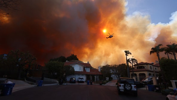 Los Angeles wildfires latest: Crews work to contain blazes as thousands flee