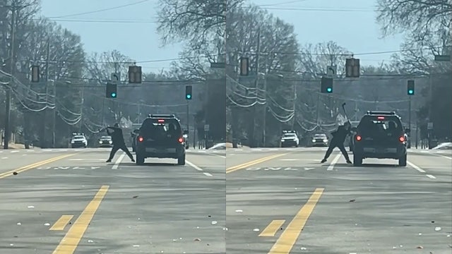 Apparent road-rage axe attack caught on camera; suspect on the run