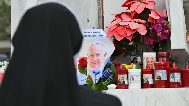 Pope Francis improves slightly, resumes some work, Vatican says