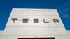 Tesla stock hit hard as market drops