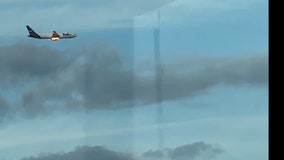 FedEx plane seen flying while on fire near Newark Airport