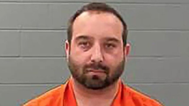 Indiana cop charged after forcing daughter, 6, to stand in freezing cold with threatening sign