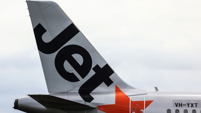 Ex-boxer and sheep shearer tackles teen with loaded shotgun on plane