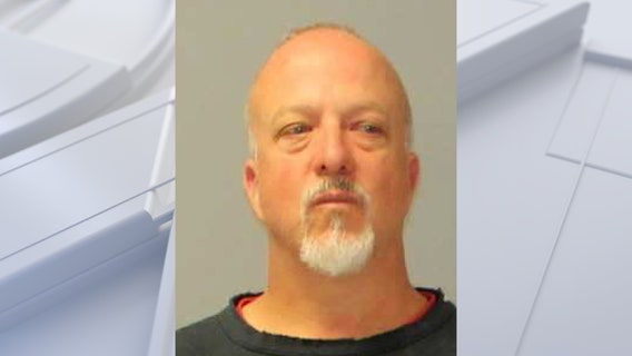 Driver accused of going wrong way on interstate to steal from crash scene