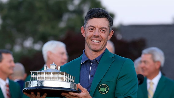 Rory McIlroy wins Masters playoff, completes Grand Slam