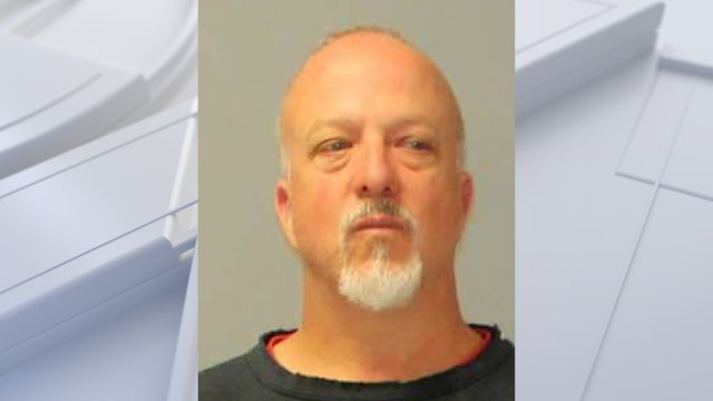 Driver accused of going wrong way on interstate to steal from crash scene