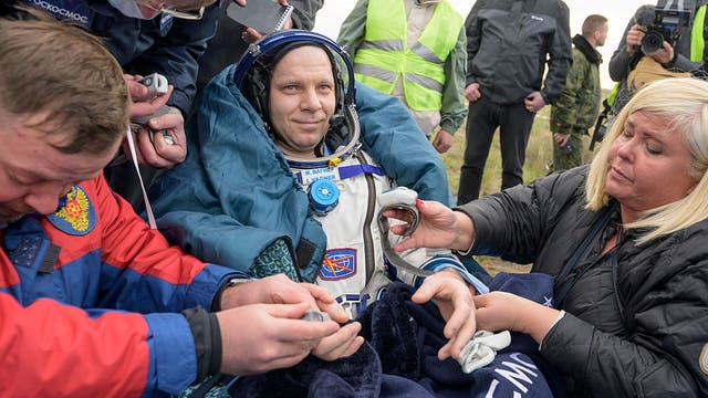 Soyuz capsule returns to Earth, bringing home 2 Russians, 1 American
