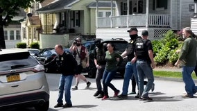 Chaotic video shows neighbors trying to stop ICE from detaining mother