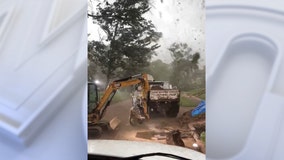 'We're in a tornado!': Watch St. Louis construction workers ride out destructive twister in their truck