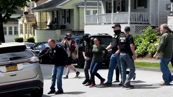 Chaotic video shows neighbors trying to stop ICE from detaining mother