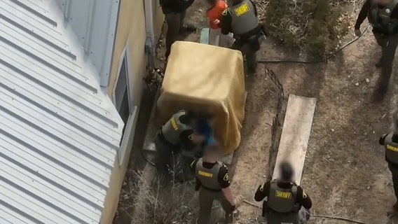 Video shows boys, age 7 and 9, in armed standoff with deputies