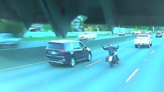 Dashcam footage shows shocking 'road rage' hit-and-run on motorcyclist