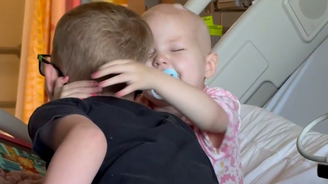 Watch: Little girl with leukemia overjoyed to see her brother after treatment