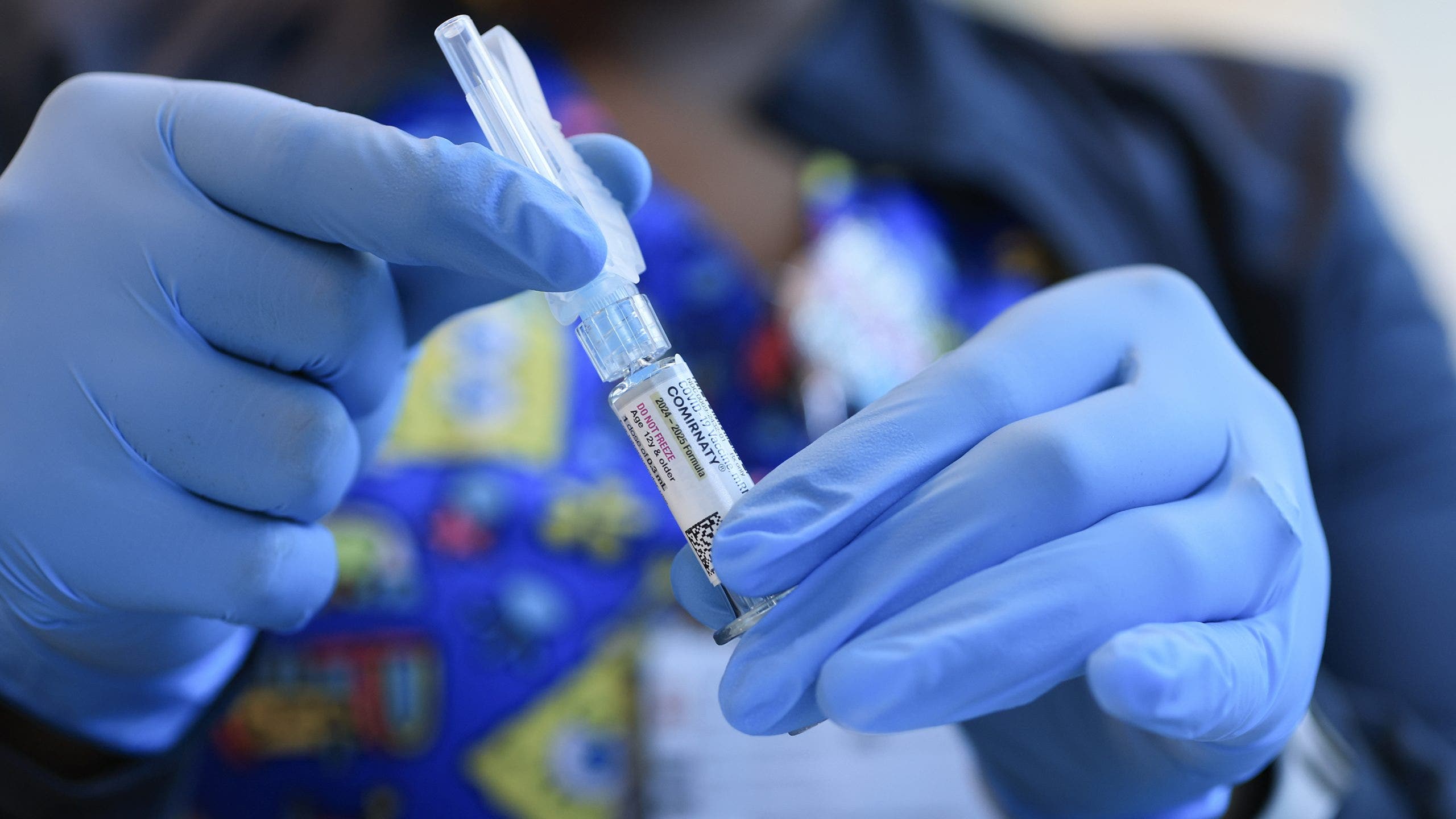 FDA expands warning about rare heart risk with COVID vaccines